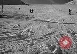 Image of ski patrolmen rescue skier Garmisch-Partenkirchen Germany, 1965, second 33 stock footage video 65675043203