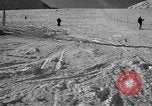 Image of ski patrolmen rescue skier Garmisch-Partenkirchen Germany, 1965, second 34 stock footage video 65675043203
