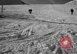 Image of ski patrolmen rescue skier Garmisch-Partenkirchen Germany, 1965, second 35 stock footage video 65675043203