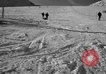 Image of ski patrolmen rescue skier Garmisch-Partenkirchen Germany, 1965, second 36 stock footage video 65675043203