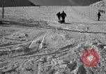 Image of ski patrolmen rescue skier Garmisch-Partenkirchen Germany, 1965, second 39 stock footage video 65675043203