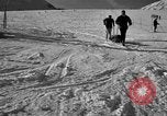 Image of ski patrolmen rescue skier Garmisch-Partenkirchen Germany, 1965, second 41 stock footage video 65675043203