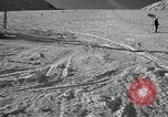 Image of ski patrolmen rescue skier Garmisch-Partenkirchen Germany, 1965, second 44 stock footage video 65675043203