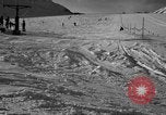 Image of ski patrolmen rescue skier Garmisch-Partenkirchen Germany, 1965, second 50 stock footage video 65675043203