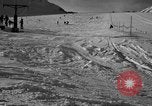 Image of ski patrolmen rescue skier Garmisch-Partenkirchen Germany, 1965, second 51 stock footage video 65675043203