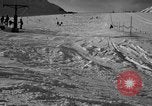 Image of ski patrolmen rescue skier Garmisch-Partenkirchen Germany, 1965, second 52 stock footage video 65675043203