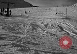 Image of ski patrolmen rescue skier Garmisch-Partenkirchen Germany, 1965, second 53 stock footage video 65675043203