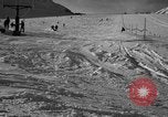 Image of ski patrolmen rescue skier Garmisch-Partenkirchen Germany, 1965, second 55 stock footage video 65675043203