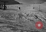 Image of ski patrolmen rescue skier Garmisch-Partenkirchen Germany, 1965, second 57 stock footage video 65675043203