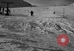 Image of ski patrolmen rescue skier Garmisch-Partenkirchen Germany, 1965, second 58 stock footage video 65675043203