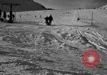 Image of ski patrolmen rescue skier Garmisch-Partenkirchen Germany, 1965, second 59 stock footage video 65675043203