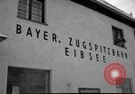 Image of Train at railroad Garmisch-Partenkirchen Germany, 1965, second 9 stock footage video 65675043205