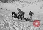 Image of Ski patrol personnel Garmisch-Partenkirchen Germany, 1965, second 46 stock footage video 65675043207