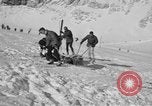 Image of Ski patrol personnel Garmisch-Partenkirchen Germany, 1965, second 60 stock footage video 65675043207