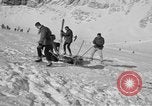 Image of Ski patrol personnel Garmisch-Partenkirchen Germany, 1965, second 61 stock footage video 65675043207