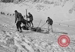 Image of Ski patrol personnel Garmisch-Partenkirchen Germany, 1965, second 62 stock footage video 65675043207