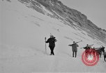 Image of Ski patrolmen Garmisch-Partenkirchen Germany, 1965, second 4 stock footage video 65675043208