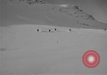 Image of Saint Bernard protecting skiers Garmisch-Partenkirchen Germany, 1965, second 3 stock footage video 65675043210