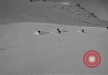 Image of Saint Bernard protecting skiers Garmisch-Partenkirchen Germany, 1965, second 5 stock footage video 65675043210