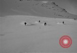 Image of Saint Bernard protecting skiers Garmisch-Partenkirchen Germany, 1965, second 6 stock footage video 65675043210