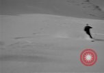 Image of Saint Bernard protecting skiers Garmisch-Partenkirchen Germany, 1965, second 12 stock footage video 65675043210