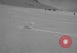 Image of Saint Bernard protecting skiers Garmisch-Partenkirchen Germany, 1965, second 14 stock footage video 65675043210