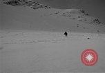 Image of Saint Bernard protecting skiers Garmisch-Partenkirchen Germany, 1965, second 17 stock footage video 65675043210