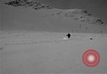 Image of Saint Bernard protecting skiers Garmisch-Partenkirchen Germany, 1965, second 18 stock footage video 65675043210