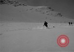 Image of Saint Bernard protecting skiers Garmisch-Partenkirchen Germany, 1965, second 20 stock footage video 65675043210