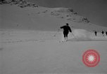 Image of Saint Bernard protecting skiers Garmisch-Partenkirchen Germany, 1965, second 21 stock footage video 65675043210