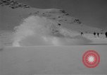 Image of Saint Bernard protecting skiers Garmisch-Partenkirchen Germany, 1965, second 22 stock footage video 65675043210