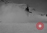 Image of Saint Bernard protecting skiers Garmisch-Partenkirchen Germany, 1965, second 23 stock footage video 65675043210