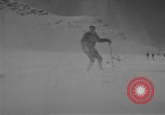Image of Saint Bernard protecting skiers Garmisch-Partenkirchen Germany, 1965, second 24 stock footage video 65675043210