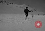 Image of Saint Bernard protecting skiers Garmisch-Partenkirchen Germany, 1965, second 28 stock footage video 65675043210