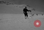 Image of Saint Bernard protecting skiers Garmisch-Partenkirchen Germany, 1965, second 29 stock footage video 65675043210