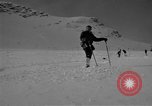 Image of Saint Bernard protecting skiers Garmisch-Partenkirchen Germany, 1965, second 30 stock footage video 65675043210