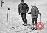 Image of Saint Bernard protecting skiers Garmisch-Partenkirchen Germany, 1965, second 33 stock footage video 65675043210