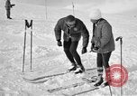 Image of Saint Bernard protecting skiers Garmisch-Partenkirchen Germany, 1965, second 34 stock footage video 65675043210