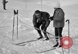 Image of Saint Bernard protecting skiers Garmisch-Partenkirchen Germany, 1965, second 36 stock footage video 65675043210