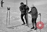 Image of Saint Bernard protecting skiers Garmisch-Partenkirchen Germany, 1965, second 37 stock footage video 65675043210