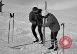 Image of Saint Bernard protecting skiers Garmisch-Partenkirchen Germany, 1965, second 38 stock footage video 65675043210