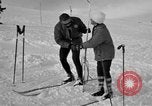 Image of Saint Bernard protecting skiers Garmisch-Partenkirchen Germany, 1965, second 39 stock footage video 65675043210