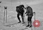 Image of Saint Bernard protecting skiers Garmisch-Partenkirchen Germany, 1965, second 40 stock footage video 65675043210