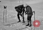 Image of Saint Bernard protecting skiers Garmisch-Partenkirchen Germany, 1965, second 41 stock footage video 65675043210