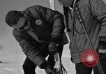 Image of Saint Bernard protecting skiers Garmisch-Partenkirchen Germany, 1965, second 47 stock footage video 65675043210