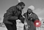 Image of Saint Bernard protecting skiers Garmisch-Partenkirchen Germany, 1965, second 53 stock footage video 65675043210