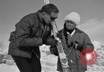 Image of Saint Bernard protecting skiers Garmisch-Partenkirchen Germany, 1965, second 54 stock footage video 65675043210