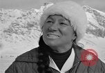 Image of Saint Bernard protecting skiers Garmisch-Partenkirchen Germany, 1965, second 62 stock footage video 65675043210
