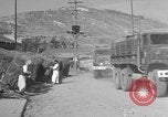 Image of United States military trucks Korea, 1954, second 53 stock footage video 65675043228