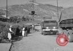 Image of United States military trucks Korea, 1954, second 57 stock footage video 65675043228